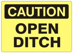 caution open ditch sign